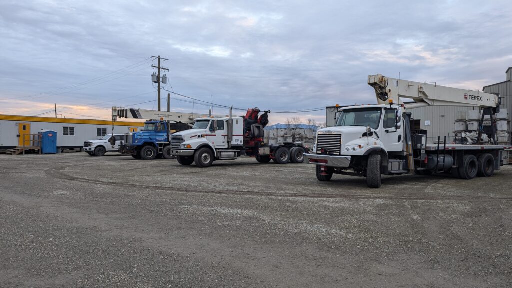 crane trucks parked in lot
